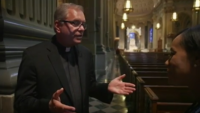 Liz Faublas interviews Father Dennis Gill of Philadelphia’s Mother Church during DNC