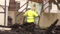 Church Burned Down – Painting of Christ Survives