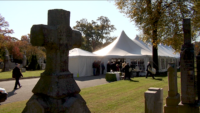 Catholics Remember All Souls During Cemetery Field Masses