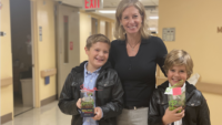 Boys Deliver Plants to Terminally Ill Patients