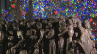 Sculpture Honoring Migrants Unveiled by Bishop DiMarzio During Christmas Tree Lighting