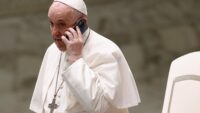 Pope Francis Takes Phone Call During General Audience