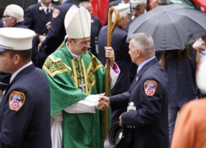Bishop_Brennan_Greeting_Firefighter_911_GSPHOTO