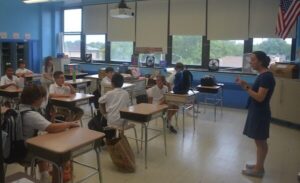 St.-Mels-Catholic-Academy-fifth-grade-teacher-Mrs.-Amy-Turturro-leads-her-students-on-the-first-day-of-school-on-Sept.-7-Photo-by-Michael-Rizzo-600x365-1