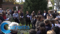 Queens Parishioners Form Living Rosary to Pray for World Peace