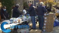 People Line Up for Catholic Charities Turkey Giveaway