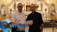 Parish Community from Basilica of Regina Pacis Make $50K Donation