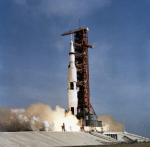 Apollo 11 space vehicle taking off from Kennedy Space Center.