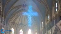 A Remarkable Moment: Cross-Shaped Light Captured at Brooklyn Church