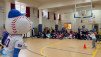 Mr. and Mrs. Met Surprise Students at St. Joan of Arc Catholic Academy in Queens