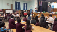 ‘The Assignment’: Author Liza Wiemer Teaches Queens Catholic School Students to Speak Out Against Injustice